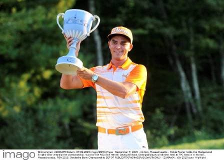 September 7, 2015 - Norton, Massachusetts - Rickie Fowler holds the Wedgewood Trophy after winning the championship round of the PGA Golf Herren Deutsche Bank Championship tournament held at TPC Boston in Norton, Massachusetts. PGA 2015: Deutsche Bank Championship SEP 07 - ZUMAc04_