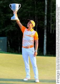 September 7, 2015 - Norton, Massachusetts - Rickie Fowler hoists the Wedgewood Trophy after winning the championship round of the PGA Golf Herren Deutsche Bank Championship tournament held at TPC Boston in Norton, Massachusetts. PGA 2015: Deutsche Bank Championship SEP 07 - ZUMAc04_