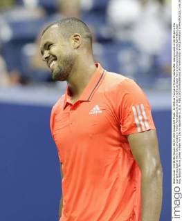 Jo-Wilfried Tsonga of France reacts after losing a point in the 5th set in the quarterfinals against Marin Cilic of Croatia in Arthur Ashe Stadium on day 9 at the US Open Tennis Championships at the USTA Billie Jean King National Tennis Center in New York City on September 8, 2015.  NYP20150908105 JOHNxANGELILLO
