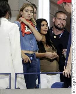 Gigi Hadid and Kim Kardashian wait for the match between Venus Williams and Serena Williams to start in Arthur Ashe Stadium on day 9 at the US Open Tennis Championships at the USTA Billie Jean King National Tennis Center in New York City on September 8, 2015.  NYP20150908109 JOHNxANGELILLO