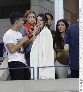 Joe Jonas, Gigi Hadid, Kendall Jenner and Kim Kardashian wait for the match between Venus Williams and Serena Williams to start in Arthur Ashe Stadium on day 9 at the US Open Tennis Championships at the USTA Billie Jean King National Tennis Center in New York City on September 8, 2015.  NYP20150908113 JOHNxANGELILLO