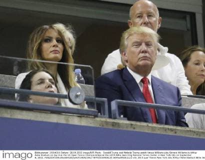 Donald Trump and Melania Trump watch Venus Williams play Serena Williams in Arthur Ashe Stadium on day 9 at the US Open Tennis Championships at the USTA Billie Jean King National Tennis Center in New York City on September 8, 2015.  NYP20150908120 JOHNxANGELILLO