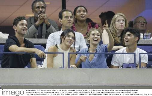 Kendall Jenner, Gigi Hadid and Joe Jonas watch Venus Williams plays Serena Williams in Arthur Ashe Stadium on day 9 at the US Open Tennis Championships at the USTA Billie Jean King National Tennis Center in New York City on September 8, 2015.  NYP20150908137 JOHNxANGELILLO