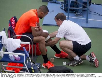 Sept. 8, 2015 - Flushing Meadows, New York, U.S - Jo-Wilfried Tsonga receives treatment on his knee during his match on Day Nine of the 2015 US Open with Marin Cilic at the USTA Billie Jean King National Tennis Center on Tuesday September 8, 2015 in the Flushing neighborhood of the Queens borough of New York City. Cilic vs. Tsonga - ZUMAp124