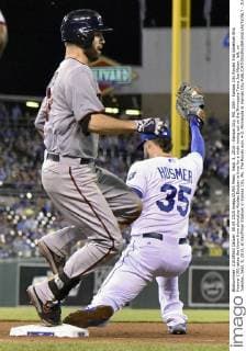 Sept. 8, 2015 - Kansas City, MO, USA - Kansas City Royals first baseman Eric Hosmer (35) takes the throw from shortstop Alcides Escobar in time for a ninth-inning out on the Minnesota Twins Joe Mauer, left, on Tuesday, Sept. 8, 2015, at Kauffman Stadium in Kansas City, Mo. The Royals won, 4-2. Minnesota at Kansas City - ZUMAm67_