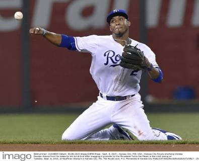 Sept. 8, 2015 - Kansas City, MO, USA - Kansas City Royals shortstop Alcides Escobar throws from his knees for an out at first after snagging a grounder by the Minnesota Twins Joe Mauer in the ninth inning on Tuesday, Sept. 8, 2015, at Kauffman Stadium in Kansas City, Mo. The Royals won, 4-2. Minnesota at Kansas City - ZUMAm67_