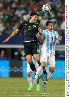 Sept. 8, 2015 - Arlington, TX, USA - Mexico s Hector Herrera (16) and Argentina s Ever Banega (19) go up for a header during the first half of a friendly on Tuesday, Sept. 8, 2015, at AT&T Stadium in Arlington, Texas. Mexico v. Argentina - ZUMAm67_