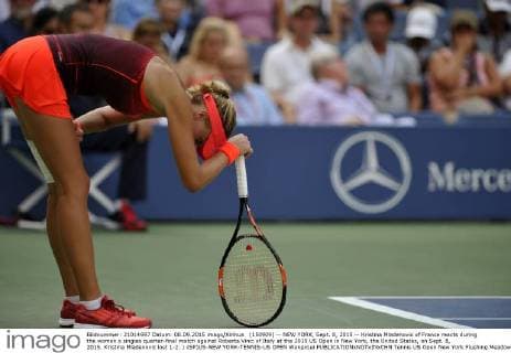 (150909) -- NEW YORK, Sept. 8, 2015 -- Kristina Mladenovic of France reacts during the women s singles quarter-final match against Roberta Vinci of Italy at the 2015 US Open in New York, the United States, on Sept. 8, 2015. Kristina Mladenovic lost 1-2. ) (SP)US-NEW YORK-TENNIS-US OPEN WangxLei 
