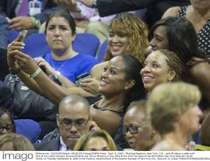 Sept. 8, 2015 - Flushing Meadows, New York, U.S - Laila Ali takes a selfie with fans at the match between Serena Williams and Venus Williams on Day Nine of the 2015 US Open at the USTA Billie Jean King National Tennis Center on Tuesday September 8, 2015 in the Flushing neighborhood of the Queens borough of New York City. Djokovic vs. Lopez - ZUMAp124