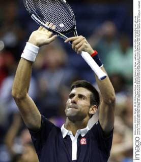 Novak Djokovic of Serbia celebrates for victory after winning the men s singles quarter-final match against Feliciano Lopez of Spain at the 2015 US Open in New York, the United States, on Sept. 8, 2015. Novak Djokovic won 3-1. ) (SP)US-NEW YORK-TENNIS-US OPEN QinxLang 