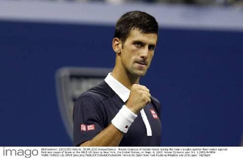 Novak Djokovic of Serbia reacts during the men s singles quarter-final match against Feliciano Lopez of Spain at the 2015 US Open in New York, the United States, on Sept. 8, 2015. Novak Djokovic won 3-1. ) (SP)US-NEW YORK-TENNIS-US OPEN QinxLang 