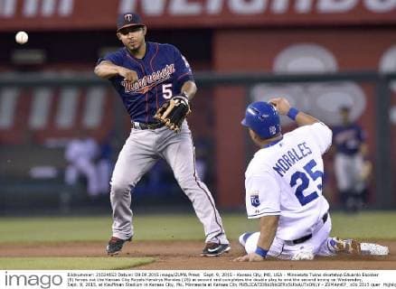 Sept. 9, 2015 - Kansas City, MO, USA - Minnesota Twins shortstop Eduardo Escobar (5) forces out the Kansas City Royals Kendrys Morales (25) at second and completes the double play to end the second inning on Wednesday, Sept. 9, 2015, at Kauffman Stadium in Kansas City, Mo. Minnesota at Kansas City - ZUMAm67_
