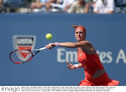 NEW YORK, Sept. 09, 2015 -- Petra Kvitova of the Czech Republic hits a return to Flavia Pennetta of Italy during their women s singles quarter-final match at the 2015 US Open in New York, the United States, on Sept. 9, 2015. Petra Kvitova lost 1-2. ) (SP)US-NEW YORK-TENNIS-US OPEN YinxBogu 