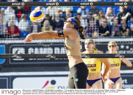 Timmendorfer Strand Kira Walkenhorst (Nr. 2, Goldenes Trikot). Ludwig Walkenhorst vs Friedrich Matthes, Beachvolleyball, Deutsche Meisterschaft, 10.09.15 , Copyright: KOENIG Eibner-Pressefoto EP_FKG
