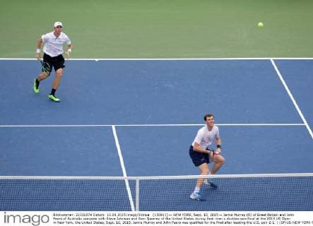 (150911) -- NEW YORK, Sept. 10, 2015 -- Jamie Murray (R) of Great Britain and John Peers of Australia compete with Steve Johnson and Sam Querrey of the United States during their men s doubles semifinal at the 2015 US Open in New York, the United States, Sept. 10, 2015. Jamie Murray and John Peers was qualified for the final after beating the U.S. pair 2-1. ) (SP)US-NEW YORK-TENNIS-US OPEN-MEN S DOUBLES-SEMIFINAL YinxBogu 