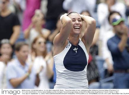 Flavia Pennetta of Italy celebrates after defeating Simona Halep of Romania 6-1, 6-3 in the semifinals in Arthur Ashe Stadium at the US Open Tennis Championships at the USTA Billie Jean King National Tennis Center in New York City on September 11, 2015.  NYP20150911132 JOHNxANGELILLO