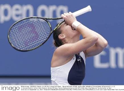 Flavia Pennetta of Italy reacts after defeating Simona Halep of Romania 6-1, 6-3 in the semifinals in Arthur Ashe Stadium at the US Open Tennis Championships at the USTA Billie Jean King National Tennis Center in New York City on September 11, 2015.  NYP20150911136 JOHNxANGELILLO