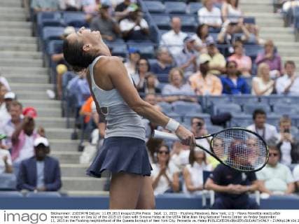Sept. 11, 2015 - Flushing Meadows, New York, U.S - Flavia Pennetta reacts after winning her match on Day 12 of the 2015 US Open with Simona Halep at the USTA Billie Jean King National Tennis Center on Friday September 11, 2015 in the Flushing neighborhood of the Queens borough of New York City. Pennetta vs. Halep - ZUMAp124