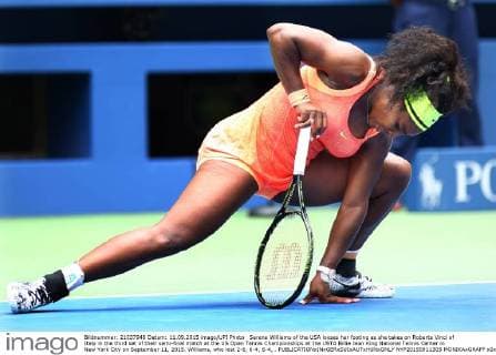 Serena Williams of the USA looses her footing as she takes on Roberta Vinci of Italy in the third set of their semi-final match at the US Open Tennis Championships at the USTA Billie Jean King National Tennis Center in New York City on September 11, 2015. Williams, who lost 2-6, 6-4, 6-4, .  NYP20150911305 MONIKAxGRAFF
