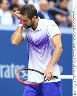Marin Cilic of Croatia takes on top seed Novak Djokovic of Serbia in their semi-final match at the US Open Tennis Championships at the USTA Billie Jean King National Tennis Center in New York City on September 11, 2015.Djokovic won 6-0,6-1,6-2.  NYP20150911312 MONIKAxGRAFF