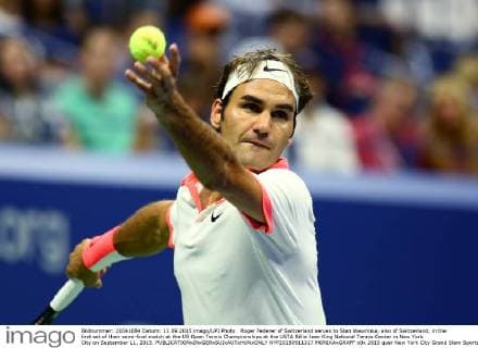 Roger Federer of Switzerland serves to Stan Wawrinka, also of Switzerland, in the first set of their semi-final match at the US Open Tennis Championships at the USTA Billie Jean King National Tennis Center in New York City on September 11, 2015.  NYP20150911317 MONIKAxGRAFF
