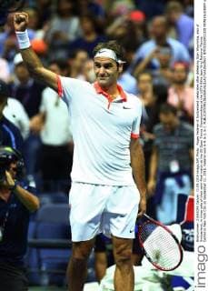 Roger Federer of Switzerland celebrates after defeating Stan Wawrinka, also of Switzerland, in three sets of their semi-final match at the US Open Tennis Championships at the USTA Billie Jean King National Tennis Center in New York City on September 11, 2015. Federer won 6-4, 6-3, 6-1.  NYP20150911328 MONIKAxGRAFF