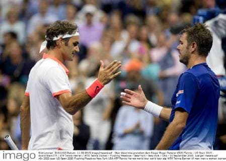 Stan Wawrinka gratuliert dem Sieger Roger Federer (SUI) Tennis - US Open 2015 - Grand Slam ITF ATP Tennis Herren WTA Tennis Damen - Flushing Meadows - New York - New York - USA - 11 September 2015. Juergen Hasenkopf