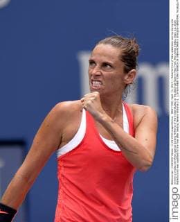 NEW YORK, Sept. 11, 2015 -- Roberta Vinci of Italy celebrates scoring during the women s singles semifinal against Serena Williams of the United States at the 2015 US Open in New York, the United States, Sept. 11, 2015. Roberta Vinci was qualified for the final after beating Serena Williams 2-1. ) (SP)US-NEW YORK-TENNIS-US OPEN-WOMEN S SINGLES-SEMIFINAL YinxBogu 
