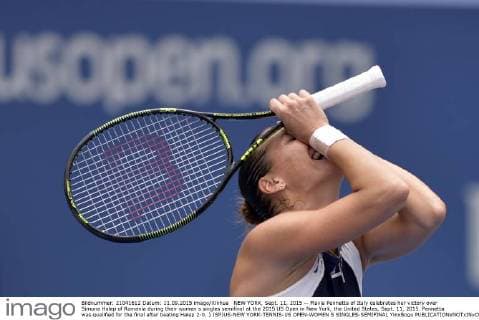NEW YORK, Sept. 11, 2015 -- Flavia Pennetta of Italy celebrates her victory over Simona Halep of Romania during their women s singles semifinal at the 2015 US Open in New York, the United States, Sept. 11, 2015. Pennetta was qualified for the final after beating Halep 2-0. ) (SP)US-NEW YORK-TENNIS-US OPEN-WOMEN S SINGLES-SEMIFINAL YinxBogu 