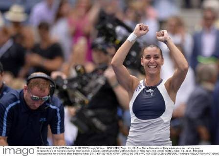 NEW YORK, Sept. 11, 2015 -- Flavia Pennetta of Italy celebrates her victory over Simona Halep of Romania during their women s singles semifinal at the 2015 US Open in New York, the United States, Sept. 11, 2015. Pennetta was qualified for the final after beating Halep 2-0. ) (SP)US-NEW YORK-TENNIS-US OPEN-WOMEN S SINGLES-SEMIFINAL YinxBogu 