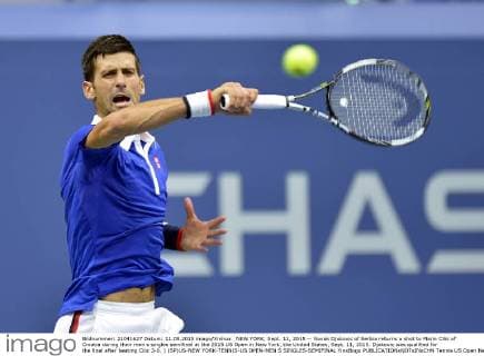 NEW YORK, Sept. 11, 2015 -- Novak Djokovic of Serbia returns a shot to Marin Cilic of Croatia during their men s singles semifinal at the 2015 US Open in New York, the United States, Sept. 11, 2015. Djokovic was qualified for the final after beating Cilic 3-0. ) (SP)US-NEW YORK-TENNIS-US OPEN-MEN S SINGLES-SEMIFINAL YinxBogu 
