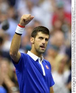 NEW YORK, Sept. 11, 2015 -- Novak Djokovic of Serbia celebrates his victory over Marin Cilic of Croatia during their men s singles semifinal at the 2015 US Open in New York, the United States, Sept. 11, 2015. Djokovic was qualified for the final after beating Cilic 3-0. ) (SP)US-NEW YORK-TENNIS-US OPEN-MEN S SINGLES-SEMIFINAL YinxBogu 