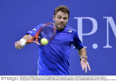NEW YORK, Sept. 11, 2015 -- Stan Wawrinka of Switzerland returns a shot to his compatriot Roger Federer during their men s singles semifinal at the 2015 US Open in New York, the United States, Sept. 11, 2015. Wawrinka lost the match 0-3. ) (SP)US-NEW YORK-TENNIS-US OPEN-MEN S SINGLES-SEMIFINAL YinxBogu 