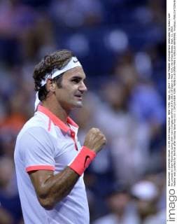 NEW YORK, Sept. 11, 2015 -- Roger Federer of Switzerland celebrates his victory over his compatriot Stan Wawrinka during their men s singles semifinal at the 2015 US Open in New York, the United States, Sept. 11, 2015. Federer was qualified for the final after beating Wawrinka 3-0. ) (SP)US-NEW YORK-TENNIS-US OPEN-MEN S SINGLES-SEMIFINAL YinxBogu 