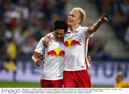 SOCCER - BL, RBS vs Groedig SALZBURG,AUSTRIA,12.SEP.15 - SOCCER - tipico Bundesliga, Red Bull Salzburg vs SV Groedig. Image shows the rejoicing of Takumi Minamino and Havard Nielsen (RBS). GEPAxpictures xFelixxRoittner
