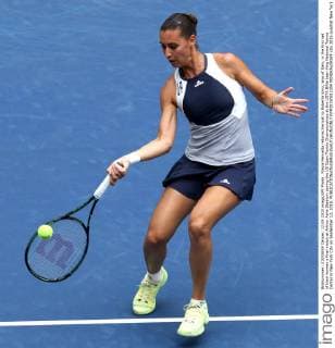Flavia Pennetta returns the ball to Roberta Vinci, also of Italy, in the first set of their women s final match at Arthur Ashe Stadium during the US Open Tennis Championships at the USTA Billie Jean King National Tennis Center in New York City on September 12, 2015.  NYP20150912304 MONIKAxGRAFF