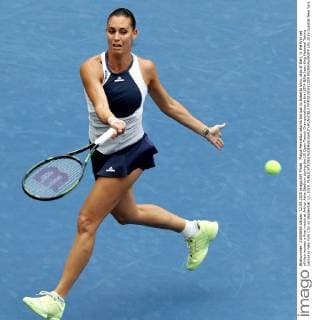 Flavia Pennetta returns the ball to Roberta Vinci, also of Italy, in the first set of their women s final match at Arthur Ashe Stadium during the US Open Tennis Championships at the USTA Billie Jean King National Tennis Center in New York City on September 12, 2015.  NYP20150912305 MONIKAxGRAFF