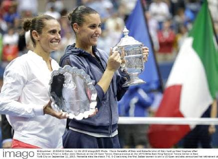 Flavia Pennetta of Italy and Roberta Vinci of Italy hold up their trophies after the Women s Final in Arthur Ashe Stadium at the US Open Tennis Championships at the USTA Billie Jean King National Tennis Center in New York City on September 12, 2015. Pennetta wins the match 7-6, 6-2 becoming the first Italian women to win a US Open and also announced her retirement at the Trophy Ceremony.  NYP20150912114 JOHNxANGELILLO