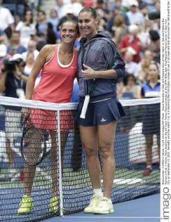 Flavia Pennetta of Italy and Roberta Vinci of Italy stand on the court before the Women s Final in Arthur Ashe Stadium at the US Open Tennis Championships at the USTA Billie Jean King National Tennis Center in New York City on September 12, 2015. Pennetta wins the match 7-6, 6-2 becoming the first Italian women to win a US Open and also announced her retirement at the Trophy Ceremony.  NYP20150912101 JOHNxANGELILLO