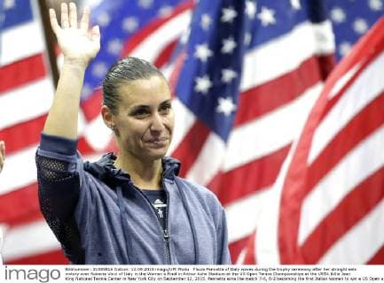 Flavia Pennetta of Italy waves during the trophy ceremony after her straight sets victory over Roberta Vinci of Italy in the Women s Final in Arthur Ashe Stadium at the US Open Tennis Championships at the USTA Billie Jean King National Tennis Center in New York City on September 12, 2015. Pennetta wins the match 7-6, 6-2 becoming the first Italian women to win a US Open and also announced her retirement at the Trophy Ceremony.  NYP20150912117 JOHNxANGELILLO