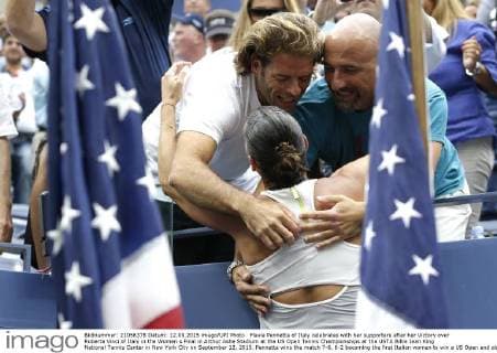 Flavia Pennetta of Italy celebrates with her supporters after her Victory over Roberta Vinci of Italy in the Women s Final in Arthur Ashe Stadium at the US Open Tennis Championships at the USTA Billie Jean King National Tennis Center in New York City on September 12, 2015. Pennetta wins the match 7-6, 6-2 becoming the first Italian women to win a US Open and also announced her possible retirement at the Trophy Ceremony.  NYP20150912124 JOHNxANGELILLO