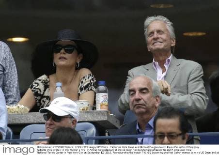 Catherine Zeta Jones and Michael Douglas watch Flavia Pennetta of Italy play Roberta Vinci of Italy in the Women s Final in Arthur Ashe Stadium at the US Open Tennis Championships at the USTA Billie Jean King National Tennis Center in New York City on September 12, 2015. Pennetta wins the match 7-6, 6-2 becoming the first Italian women to win a US Open and also announced her possible retirement at the Trophy Ceremony.  NYP20150912133 JOHNxANGELILLO