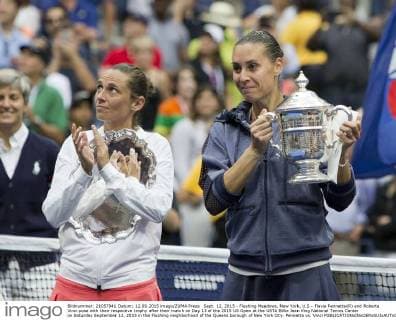 Sept. 12, 2015 - Flushing Meadows, New York, U.S - Flavia Pennetta(R) and Roberta Vinci pose with their respective trophy after their match on Day 13 of the 2015 US Open at the USTA Billie Jean King National Tennis Center on Saturday September 12, 2015 in the Flushing neighborhood of the Queens borough of New York City. Pennetta vs. Vinci - ZUMAp124