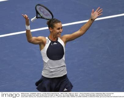 NEW YORK, Sept.12, 2015 -- Flavia Pennetta of Italy celebrates after winning the women s singles final match at the 2015 US Open in New York, the United States, Sept. 12, 2015. Flavia Pennetta claimed the title of the event after beating her compatriot Roberta Vinci 2-0. ) (SP)US-NEW YORK-TENNIS-US OPEN-WOMEN S SINGLES-FINAL QinxLang 
