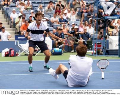 NEW YORK, Sept.12, 2015 -- Pierre-Hugues Herbert (L) and Nicolas Mahut of France celebrate after winning the men s doubles final match at the 2015 US Open in New York, the United States, Sept. 12, 2015. The French pair claimed the title of the event after beating Jamie Murray of Great Britain and John Peers of Australia 2-0. ) (SP)US-NEW YORK-TENNIS-US OPEN-MEN S DOUBLES-FINAL YinxBogu 