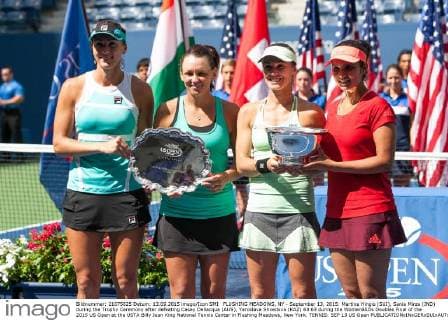 FLUSHING MEADOWS, NY - September 13, 2015: Martina Hingis (SUI), Sania Mirza (IND) during the Trophy Ceremony after defeating Casey Dellacqua (AUS), Yaroslava Shvedova (KAZ) 63 63 during the WomenâÄ?s Doubles Final of the 2015 US Open at the USTA Billy Jean King National Tennis Center in Flushing Meadows, New York. TENNIS: SEP 13 US Open Icon150913044 EDITORIAL USE ONLY