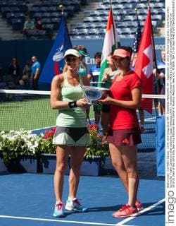 FLUSHING MEADOWS, NY - September 13, 2015: Martina Hingis (SUI), Sania Mirza (IND) during the Trophy Ceremony after defeating Casey Dellacqua (AUS), Yaroslava Shvedova (KAZ) 63 63 during the WomenâÄ?s Doubles Final of the 2015 US Open at the USTA Billy Jean King National Tennis Center in Flushing Meadows, New York. TENNIS: SEP 13 US Open Icon150913039 EDITORIAL USE ONLY