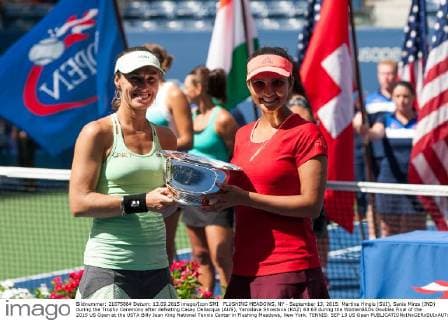 FLUSHING MEADOWS, NY - September 13, 2015: Martina Hingis (SUI), Sania Mirza (IND) during the Trophy Ceremony after defeating Casey Dellacqua (AUS), Yaroslava Shvedova (KAZ) 63 63 during the WomenâÄ?s Doubles Final of the 2015 US Open at the USTA Billy Jean King National Tennis Center in Flushing Meadows, New York. TENNIS: SEP 13 US Open Icon150913040 EDITORIAL USE ONLY