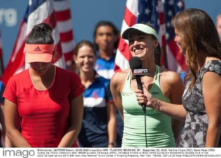 FLUSHING MEADOWS, NY - September 13, 2015: Martina Hingis (SUI), Sania Mirza (IND) during the Trophy Ceremony after defeating Casey Dellacqua (AUS), Yaroslava Shvedova (KAZ) 63 63 during the WomenâÄ?s Doubles Final of the 2015 US Open at the USTA Billy Jean King National Tennis Center in Flushing Meadows, New York. TENNIS: SEP 13 US Open Icon150913031 EDITORIAL USE ONLY