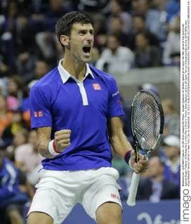 Novak Djokovic of Serbia reacts as he wins the fifth game of the fourth set against Roger Federer of Switzerland in the Men s Final in Arthur Ashe Stadium at the US Open Tennis Championships at the USTA Billie Jean King National Tennis Center in New York City on September 13, 2015.  NYP20150913823 RAYxSTUBBLEBINE